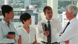 Video: Business people talking while standing Business people talking while standing