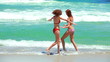 Video: Two women playing at the beach Two women playing at the beach