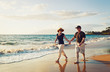 Senior Couple Enjoying Sunset at the Beach