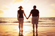 Senior Couple Enjoying Sunset at the Beach