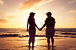 Senior Couple Enjoying Sunset at the Beach