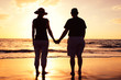 Senior Couple Enjoying Sunset at the Beach