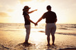 Senior Couple Enjoying Sunset at the Beach