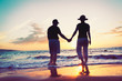 Senior Couple Enjoying Sunset at the Beach