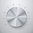 Photo: Shiny silver volume knob over brushed metal background Shiny silver volume knob over brushed metal background