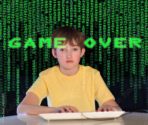 Photo: Teenager having problems with computer. Concept Teenager having problems with computer. Concept