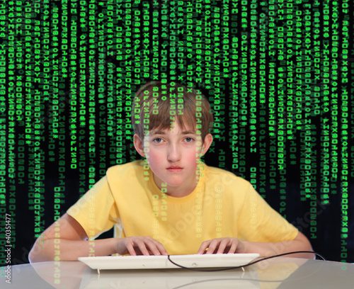 Photo: Teenager having problems with computer. Concept Teenager having problems with computer. Concept