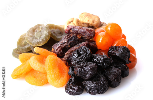 Photo: Dried fruits isolated on white Dried fruits isolated on white