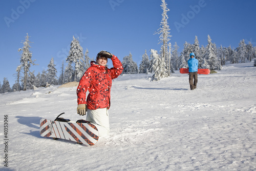 Photo: Friends with snowboard on snow Friends with snowboard on snow