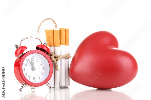 Photo: Cigarettes tied with rope and wick isolateed on white Cigarettes tied with rope and wick isolateed on white