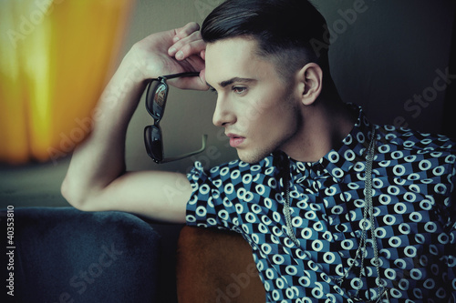Photo: Vogue style portrait of a young guy Vogue style portrait of a young guy