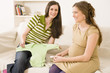 Women sitting on sofa