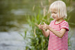 Girl playing in stream