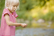 Girl playing in stream