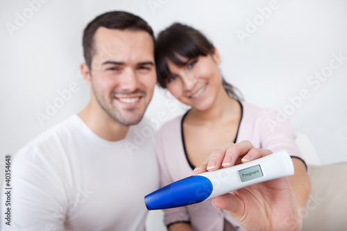 Photo: Couple finding out results of pregnancy test Couple finding out results of pregnancy test