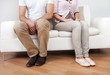 Photo: Young couple in quarrel at home Young couple in quarrel at home