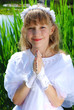 girl going to the first holy communion