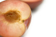 Close up of peach cut in half