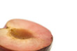 Close up of peach cut in half