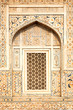 Details of polished marble surface is covered by stone inlay.