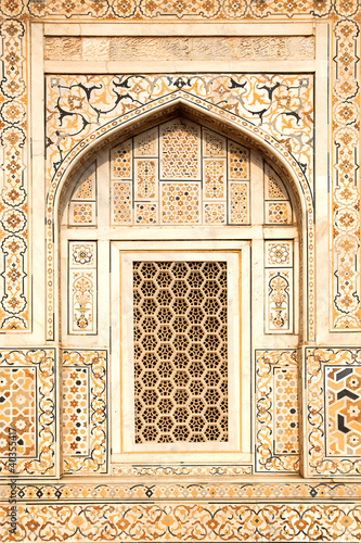 Photo: Details of polished marble surface is covered by stone inlay. Details of polished marble surface is covered by stone inlay.