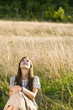 Mid adult woman in field