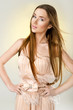 Foto: spring shot of welldressed young dark blond girl spring shot of welldressed young dark blond girl
