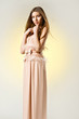 Foto: spring shot of welldressed young dark blond girl spring shot of welldressed young dark blond girl