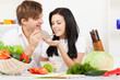 young couple in kitchen