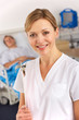 American nurse working on hospital ward