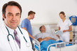 American doctor and team on hospital ward