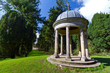 Green garden with stone pavilion