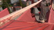 Painting roof of a private house, close-up