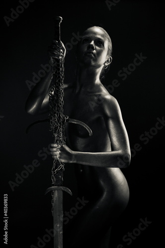 Photo: Silver amazon with sword Silver amazon with sword