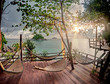 Seculed terrace with wooden hammocks