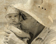 Photo: happy grandpa is holding a little granddaughter. Background - th happy grandpa is holding a little granddaughter. Background - th