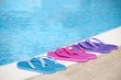 Colorful slippers by pool