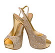 gold women's shoes isolated on white background