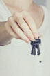 Woman's hand holding new keys