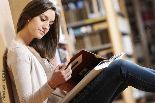 Photo: young woman with book young woman with book