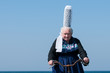 breton headdress under a blue sky