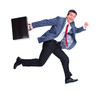 Happy running businessman.