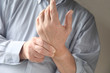 man has pain in wrist