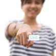 Woman pressing like button Woman pressing like button