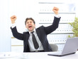 Successful business man with arms opened at the