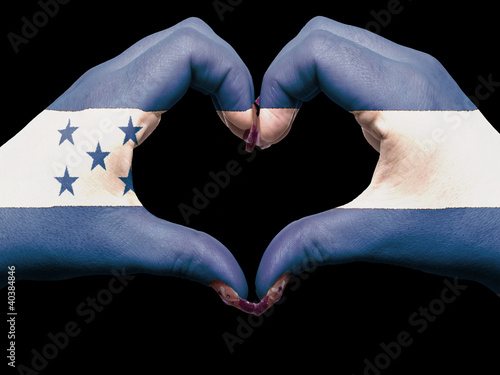 Foto: Heart and love gesture by hands colored in honduras flag for tou Heart and love gesture by hands colored in honduras flag for tou
