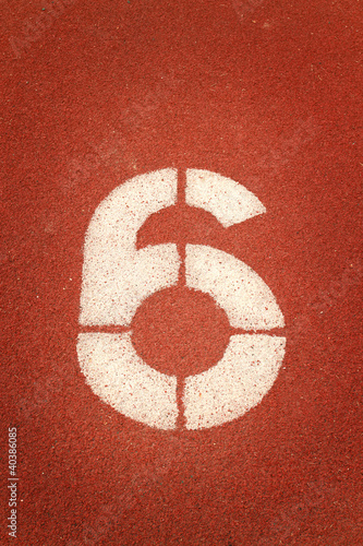 Photo: Number 6 on running track Number 6 on running track
