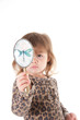 Child looking in a mirror