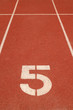 Number 5 on running track Number 5 on running track