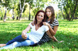 Mother with her daughter in summer park